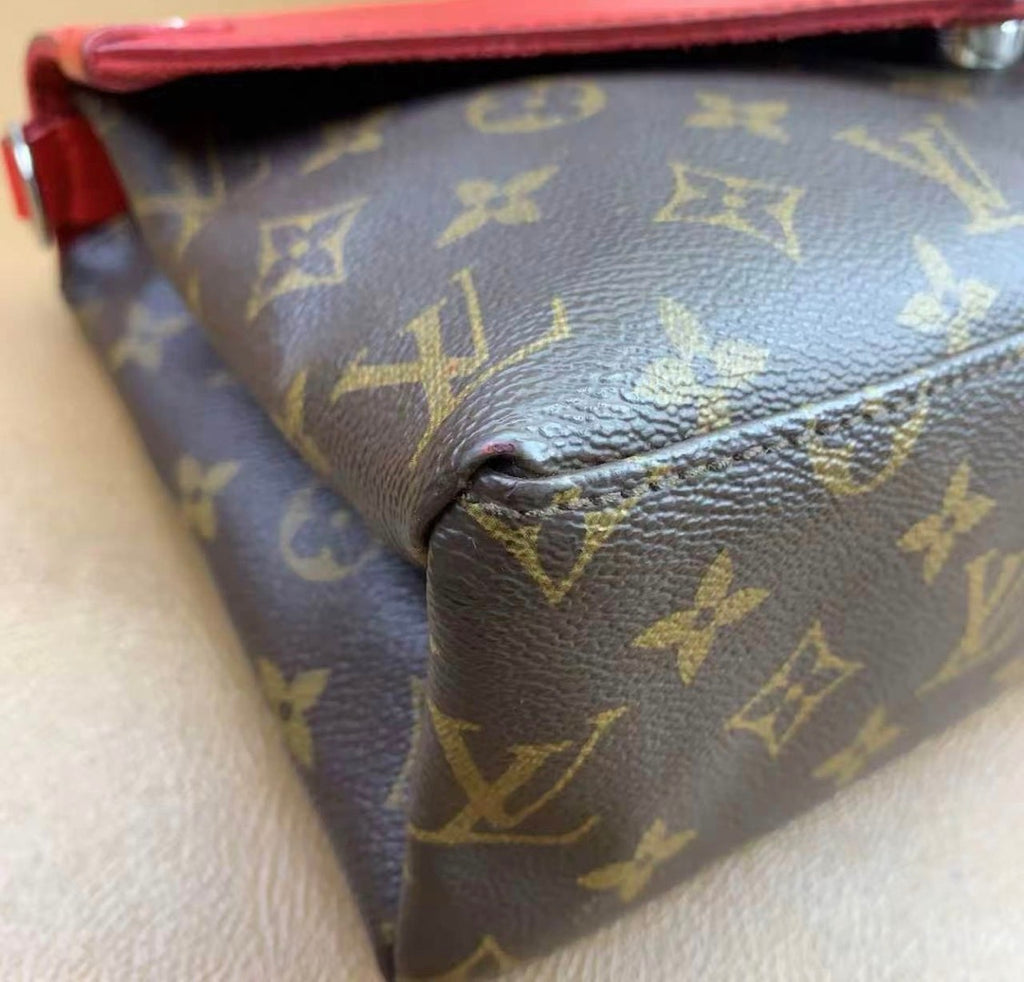 Louis Vuitton
Saint Michel Handbag Monogram Canvas and Epi Leather