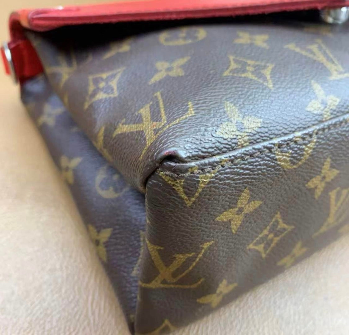 Louis Vuitton
Saint Michel Handbag Monogram Canvas and Epi Leather