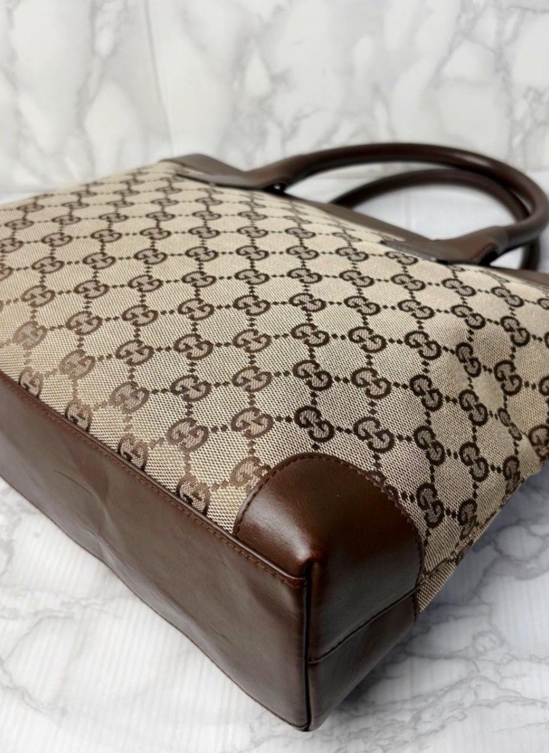 Authentic Gucci GG Canvas Britt handbag