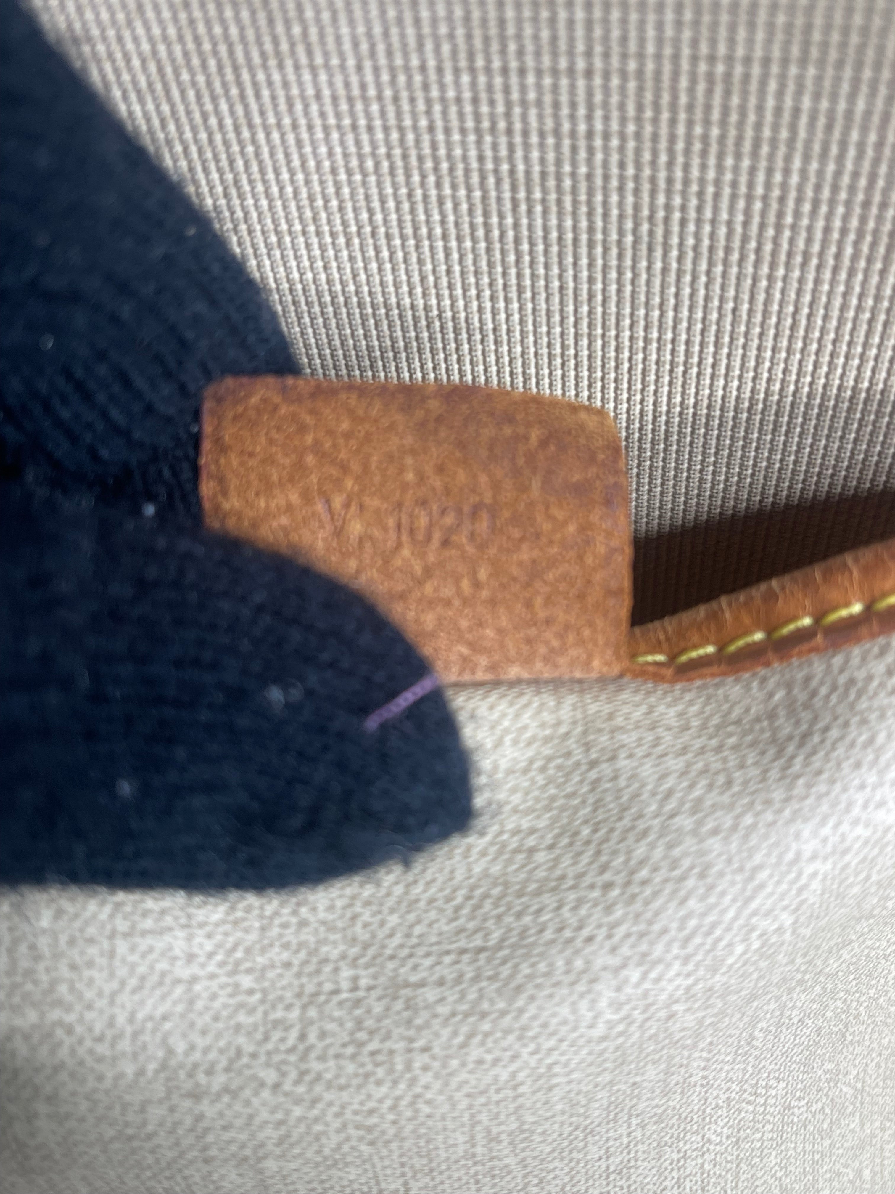 LOUIS VUITTON Monogram Excursion Hand Bag