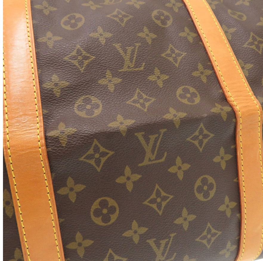 LOUIS VUITTON
Keepall 55 Monogram Canvas Travel Bag Brown