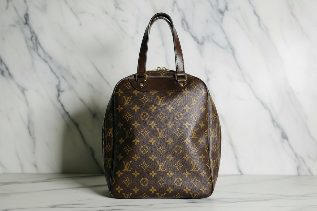 LOUIS VUITTON Monogram Excursion Hand Bag