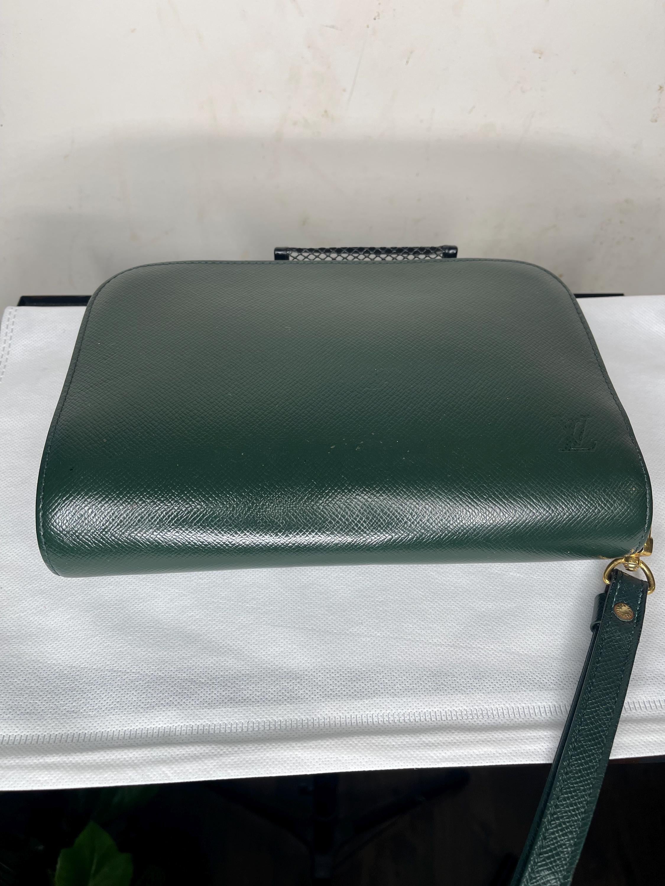 Authentic LOUIS VUITTON Taiga Baikal Leather Clutch Bag