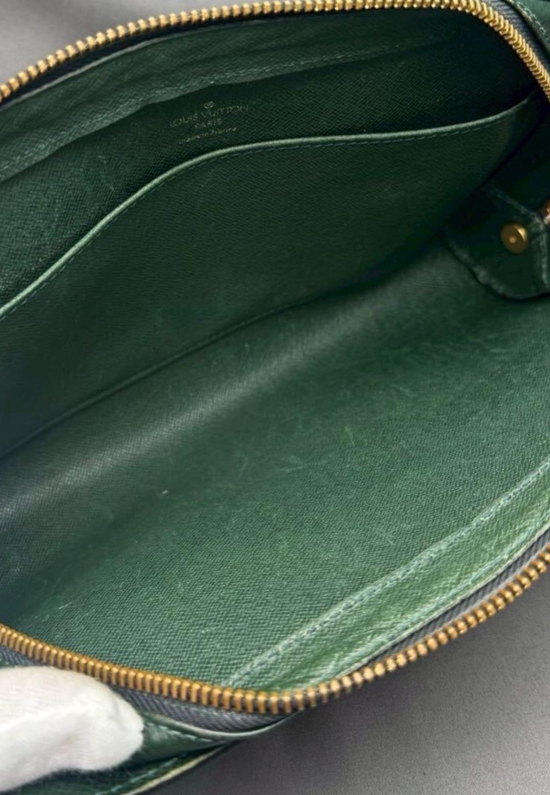 Authentic LOUIS VUITTON Taiga Baikal Leather Clutch Bag