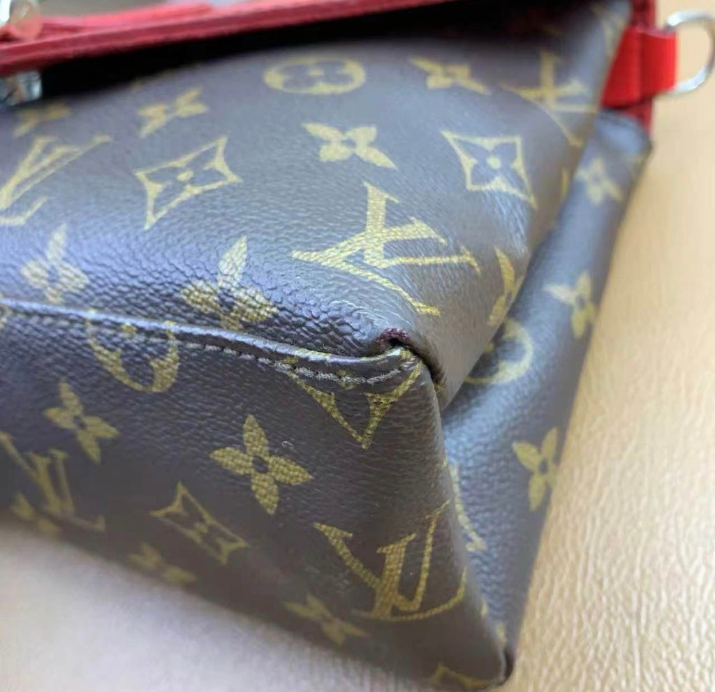 Louis Vuitton
Saint Michel Handbag Monogram Canvas and Epi Leather