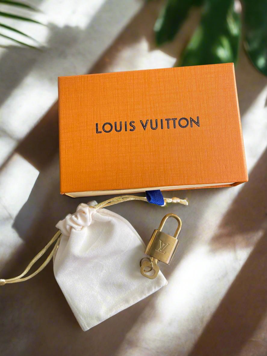 Authentic Louis Vuitton Brass Lock & Key Set