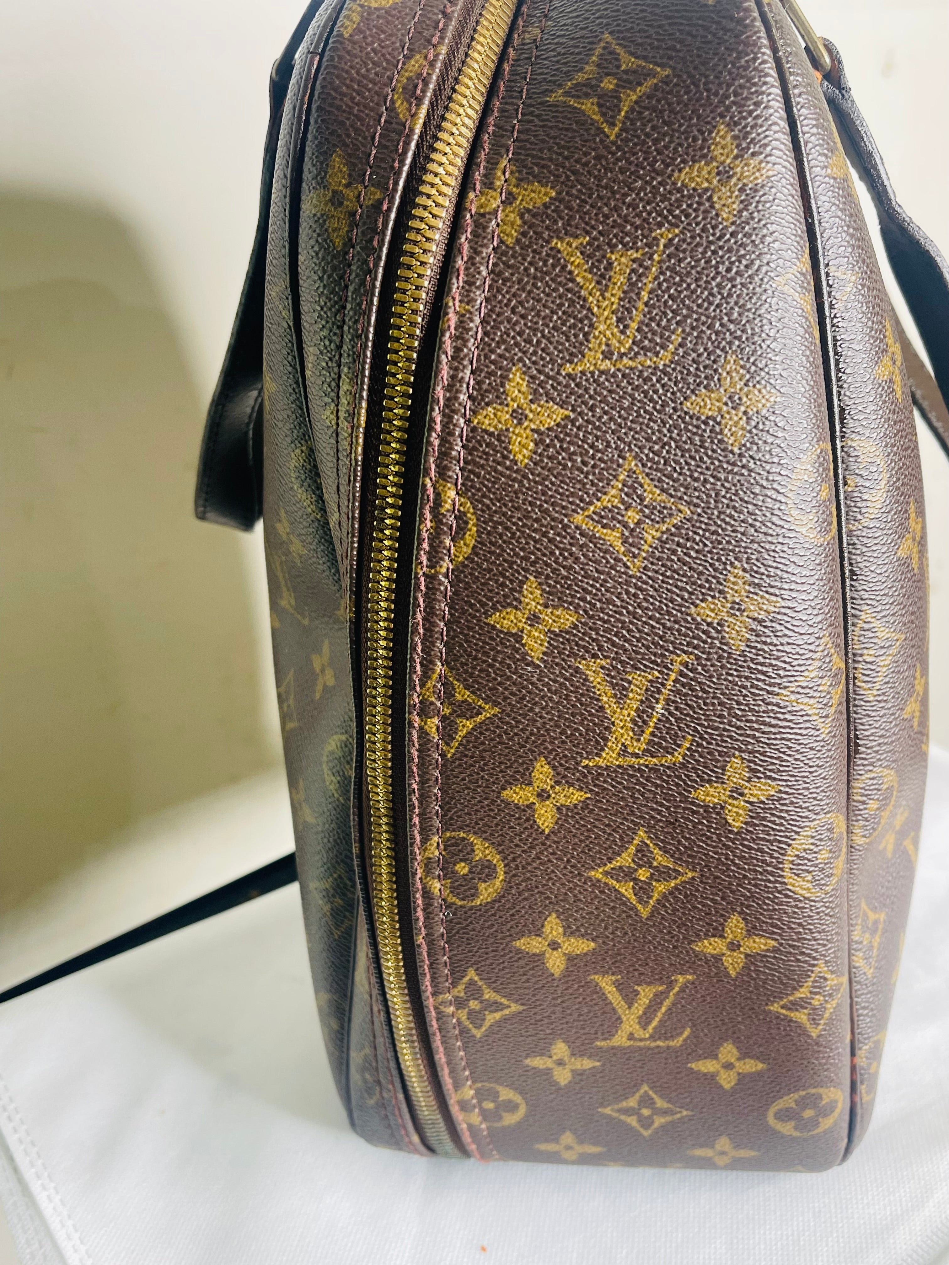 LOUIS VUITTON Monogram Excursion Hand Bag
