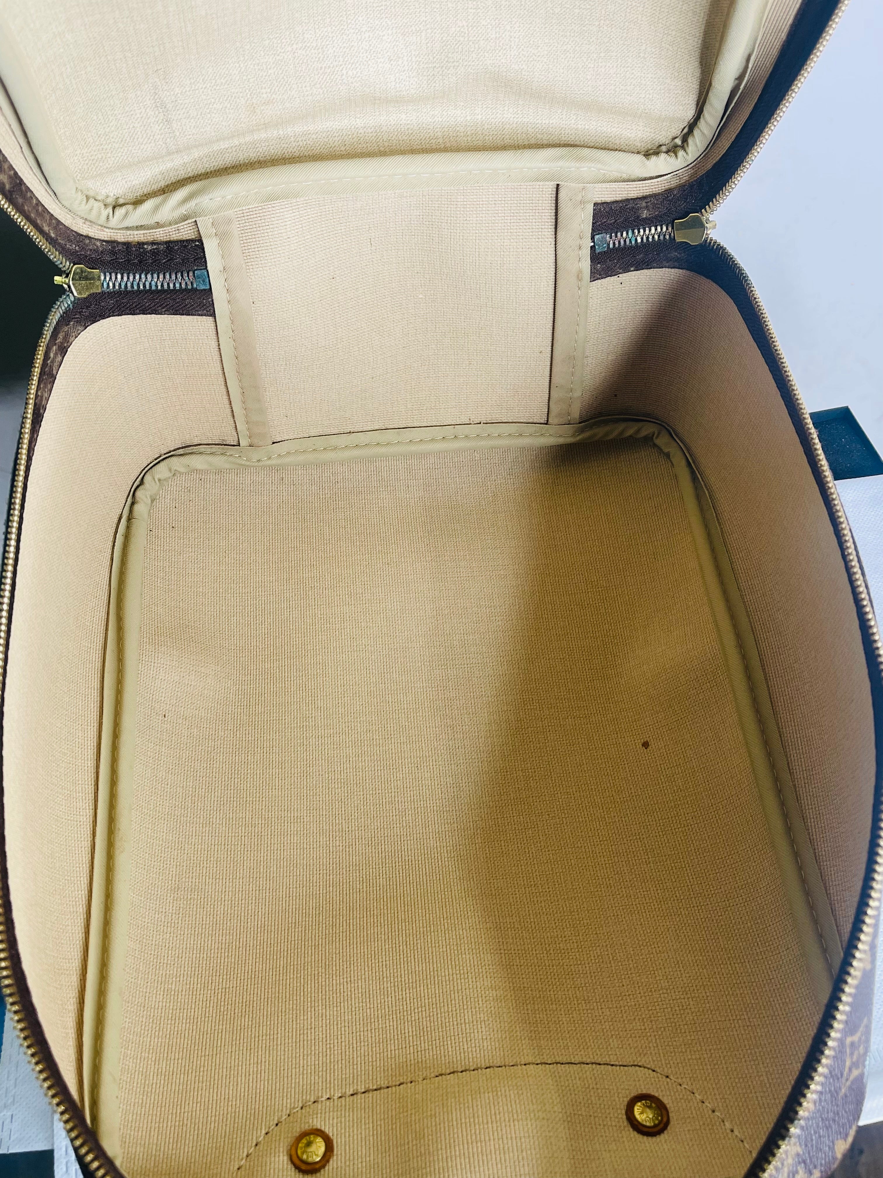LOUIS VUITTON Monogram Excursion Hand Bag