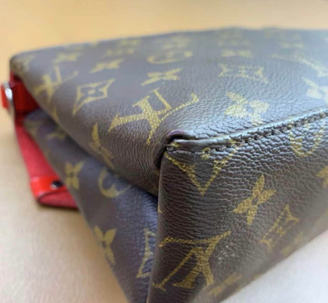 Louis Vuitton
Saint Michel Handbag Monogram Canvas and Epi Leather