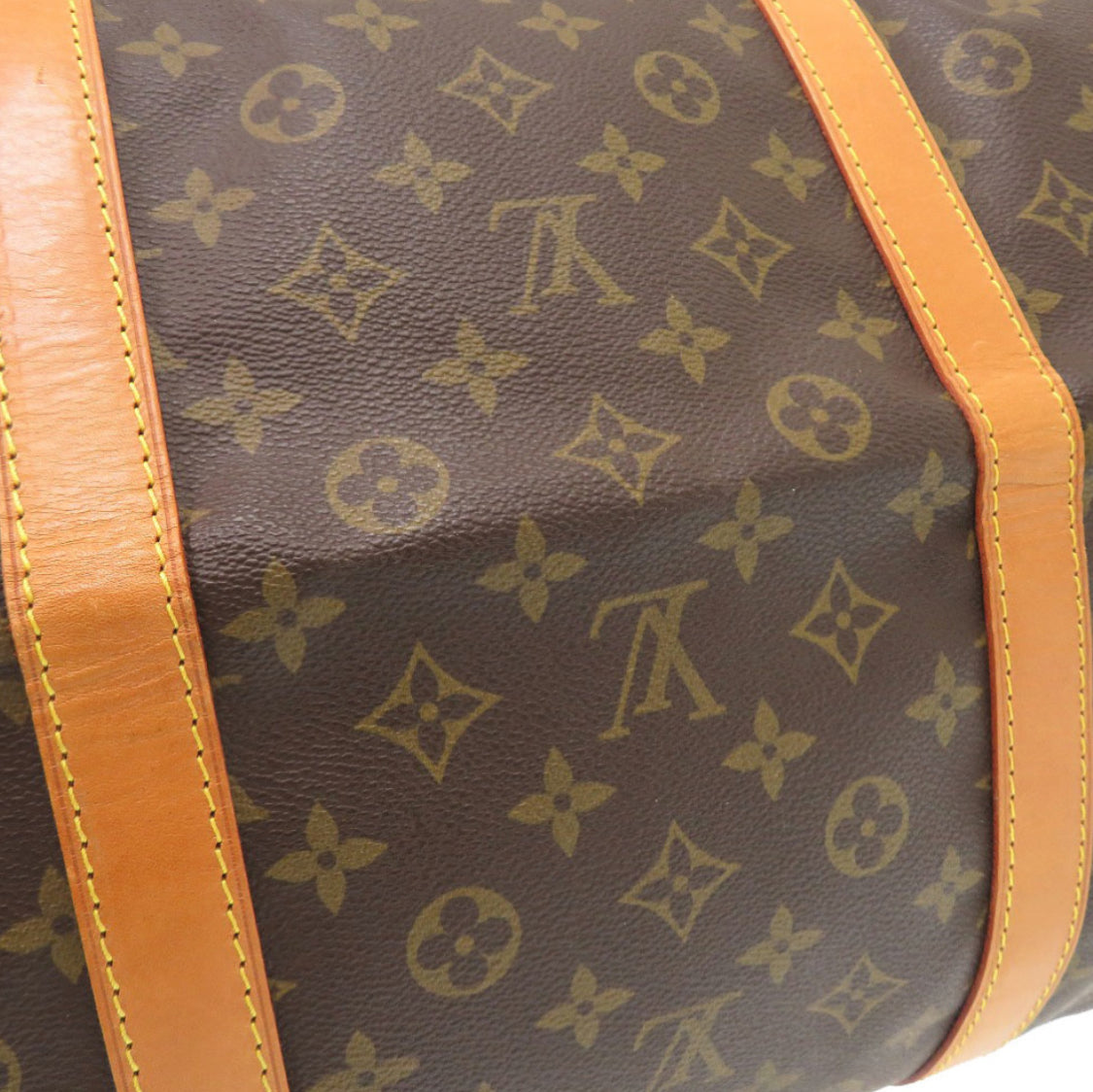 LOUIS VUITTON
Keepall 55 Monogram Canvas Travel Bag Brown