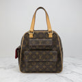 LOUIS VUITTON
Monogram Excentri-Cite