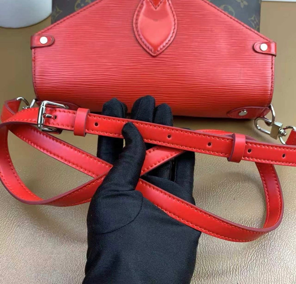 Louis Vuitton
Saint Michel Handbag Monogram Canvas and Epi Leather
