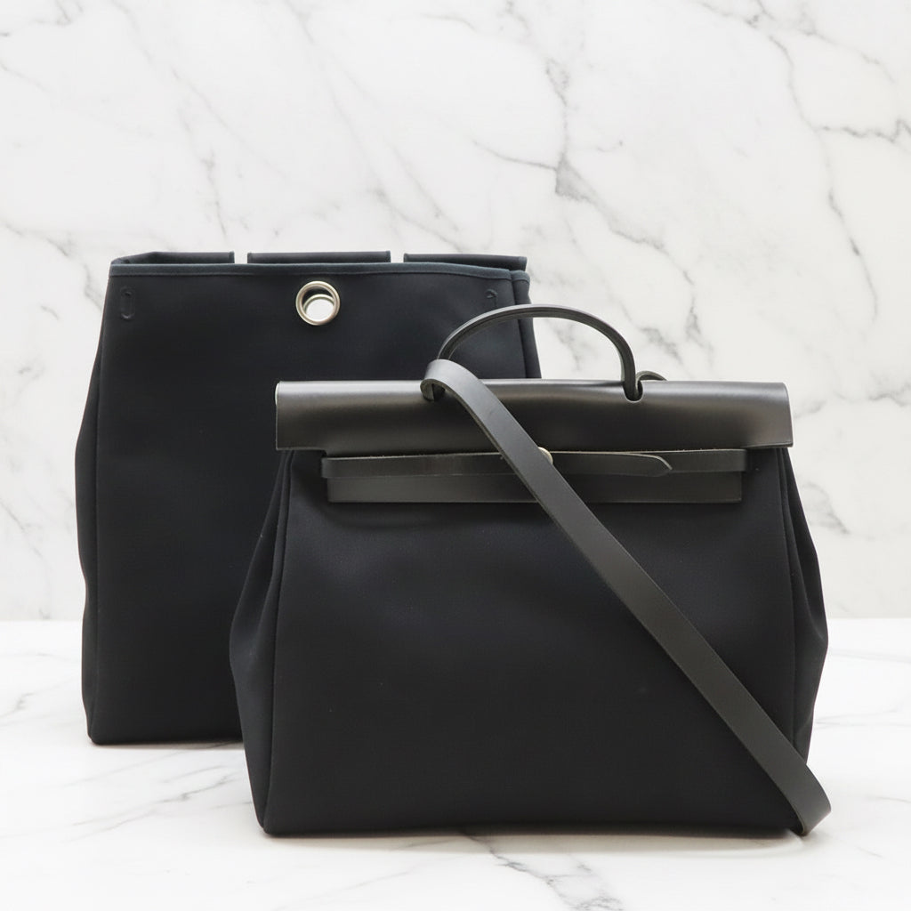 Hermes
Herbag Toile and Leather MM Shoulder Bag