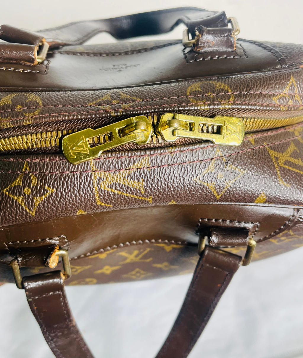 LOUIS VUITTON Monogram Excursion Hand Bag