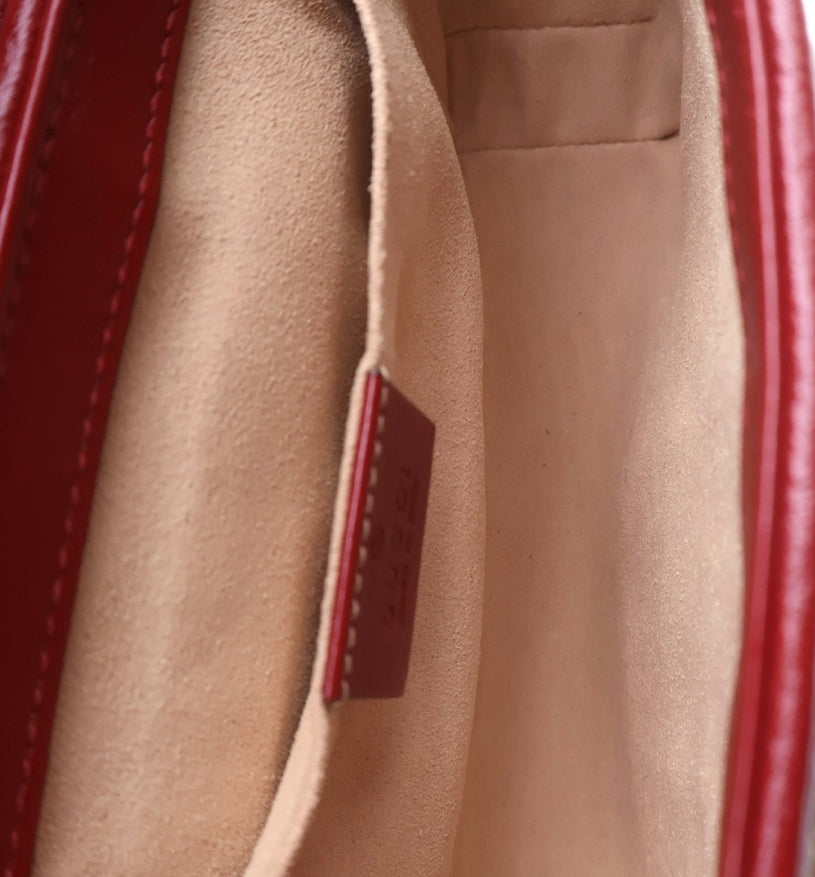 GUCCI Small GG Marmont Matelassé Diagonal GG Canvas and Leather shoulder bag.