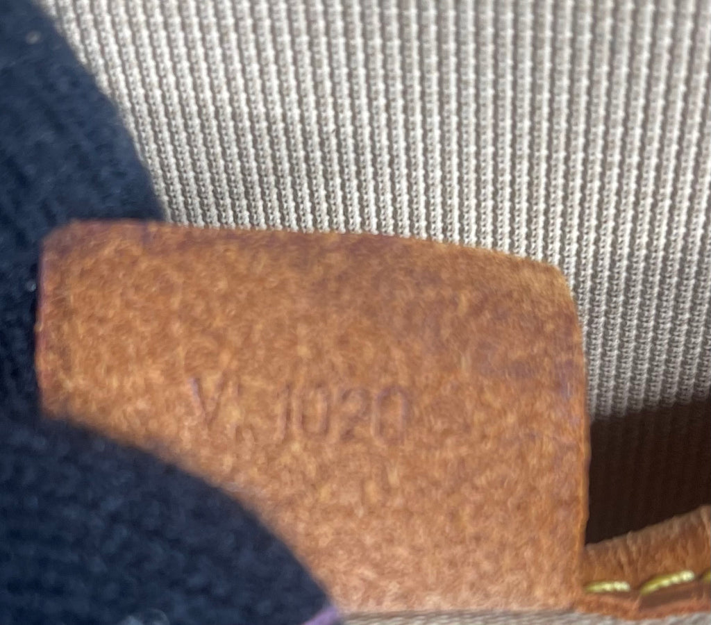 LOUIS VUITTON Monogram Excursion Hand Bag