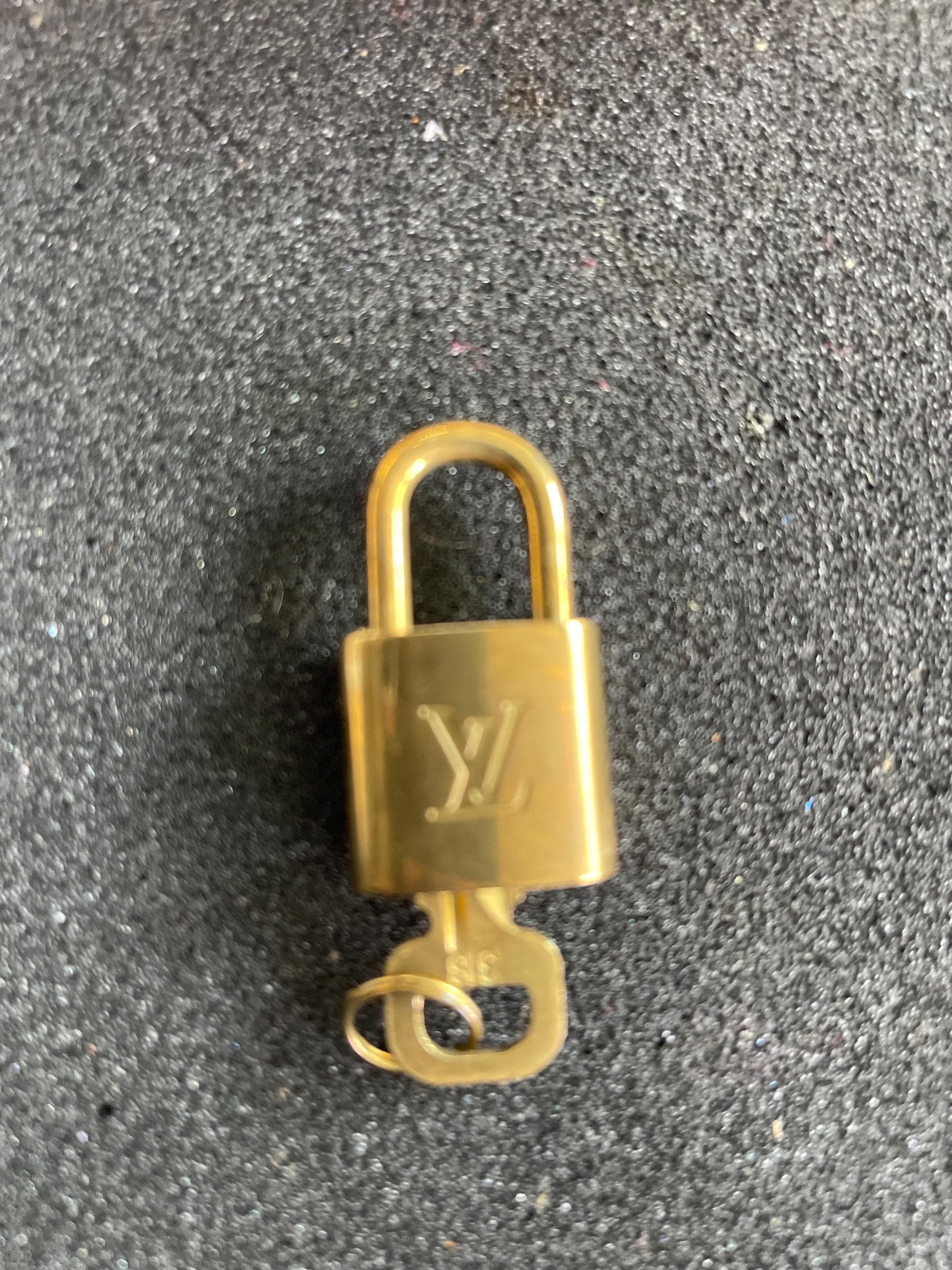 Authentic Louis Vuitton Brass Lock & Key Set