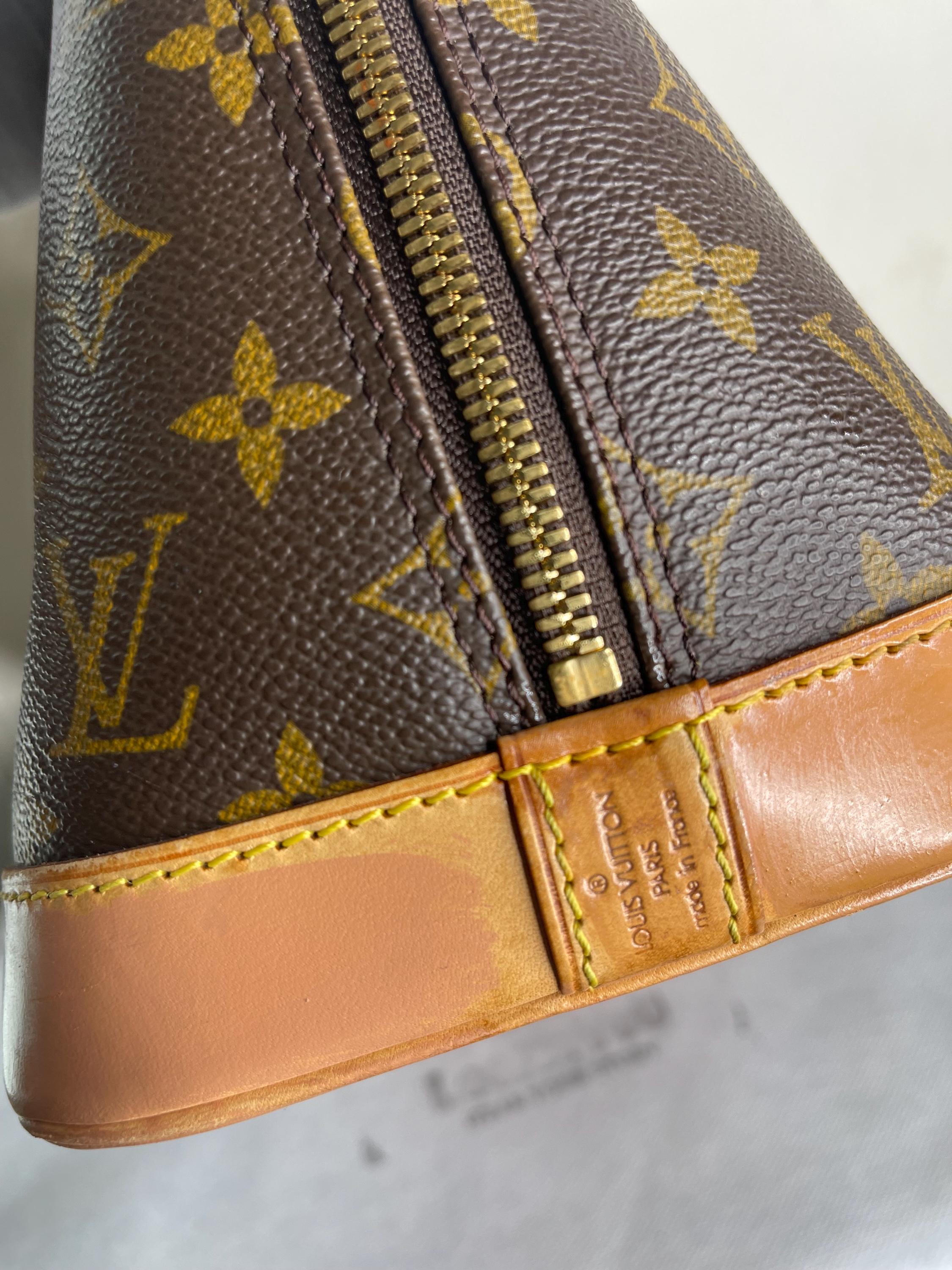 Authentic Louis Vuitton Alma PM Handbag  W / Name Tag , Lock & Key