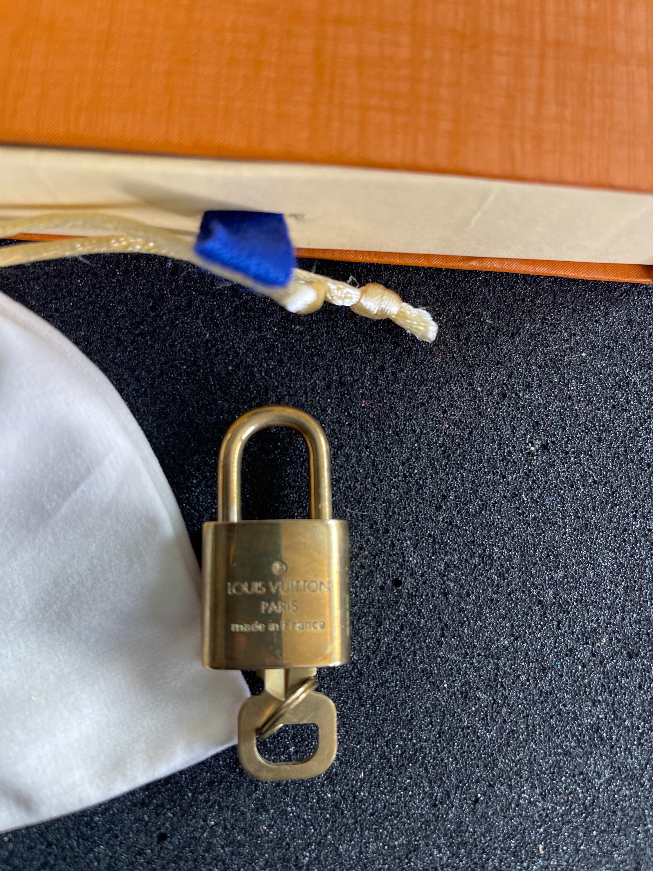 Authentic Louis Vuitton Brass Lock & Key Set