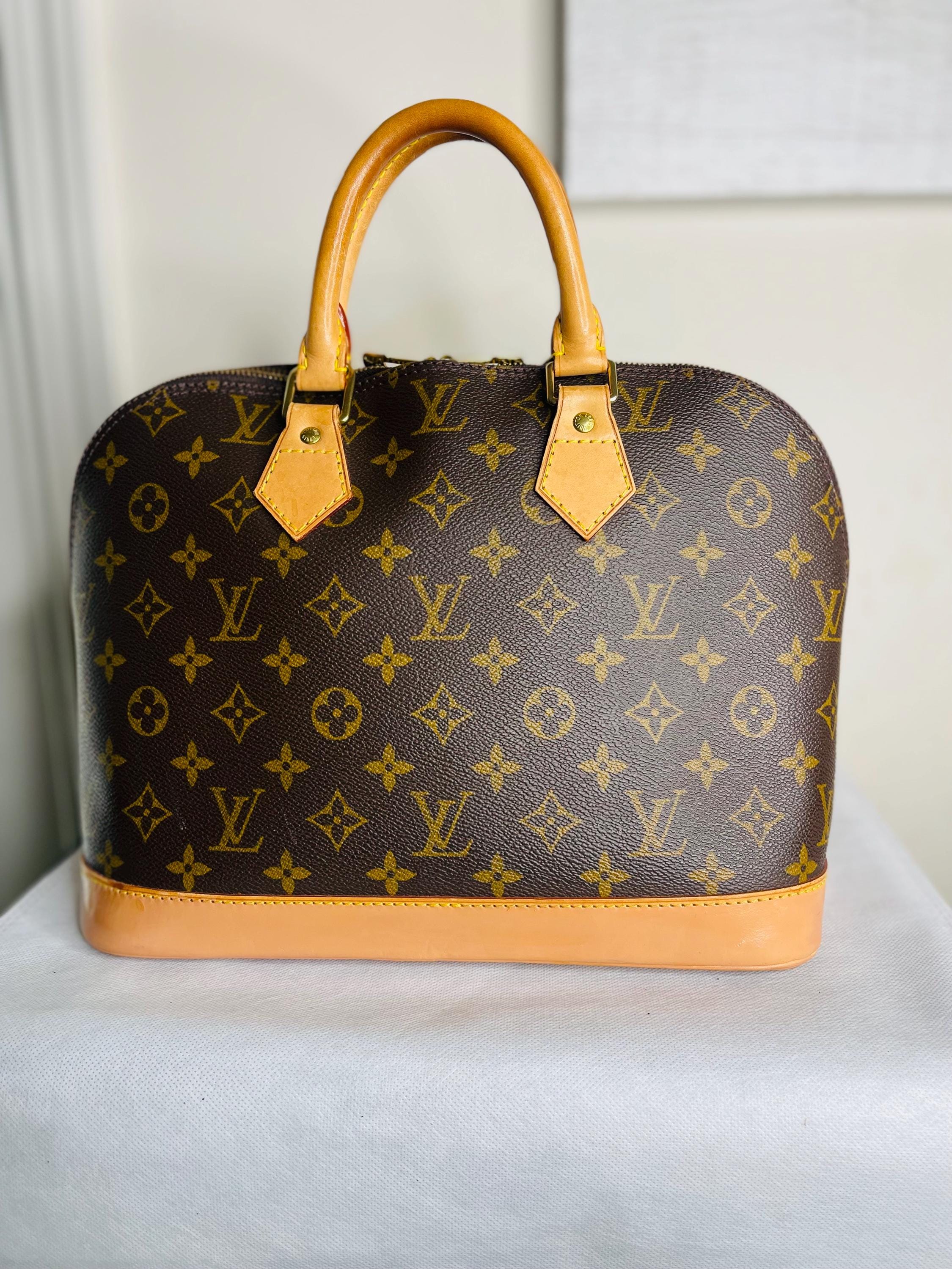 Authentic Louis Vuitton Alma PM Handbag  W / Name Tag , Lock & Key