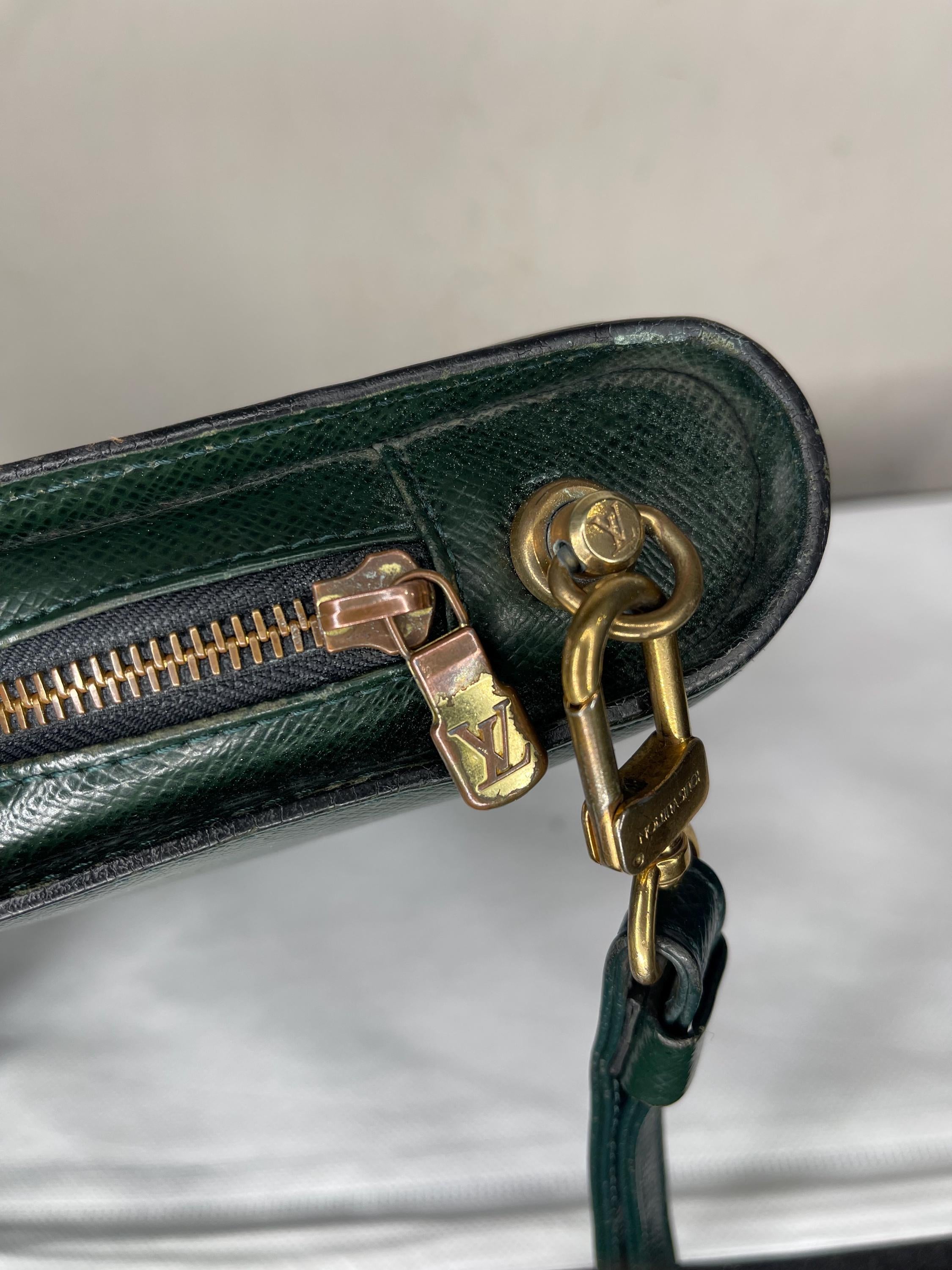 Authentic LOUIS VUITTON Taiga Baikal Leather Clutch Bag